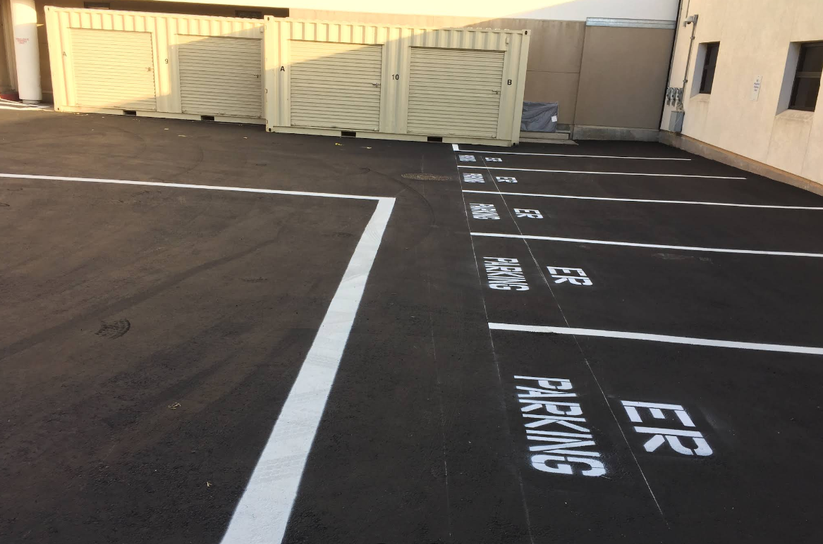 Parking lot with ER parking designation markings